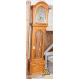A reproduction oak longcase clock, height 210cm