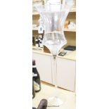 A tall glass stemmed vase / candle holder, height 69cm