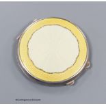 A George VI silver and yellow guilloche enamel circular compact, Birmingham, 1944, 65mm.