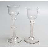 Two Georgian opaque twist stem cordial glasses, each with a funnel bowl, one engraved C B with dove