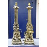 A pair of gilt metal column lamp bases, total height 61 cm