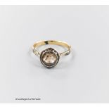 An antique continental yellow metal and solitaire rose cut diamond set ring, size M/N, gross weight
