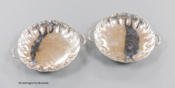 A pair of 1930's silver two handled shallow dishes, Goldsmiths & Silversmiths Co Ltd, London, 1937,