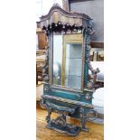 An Iberian green-painted and parcel-gilt rectangular wall mirror,foliate-carved and pierced and