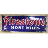 A Firestone Most Miles enamel sign, 15 x 40cm