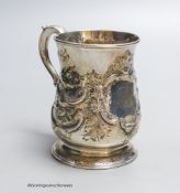 A George II provincial silver baluster mug, with later embossed decoration, James Kirkup,