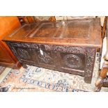 A late 17th century carved and panelled oak coffer, length 118cm, depth 52cm, height 64cm