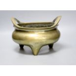 A large Chinese bronze tripod censer Xuande mark, early 20th century, 25cm wide