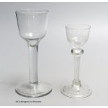 Two Georgian drinking glasses including a light baluster type cordial glass and a plain stem wine
