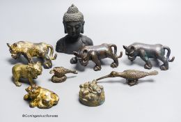 A group of nine Chinese and Oriental bronze figures to include five Han Dynasty style bronzes,