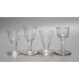 Four Georgian 'Toast Master' glasses, one with opaque twist stem, c.1760-80