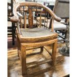A Chinese elm stickback elbow chair, width 62cm, depth 42cm, height 86cm