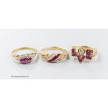 Three modern 9ct gold, ruby and diamond set dress rings including a 'Love' ring, size O, gross