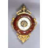 A French pottery and gilt metal cartel timepiece, height 38cm