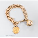 A 9ct gold graduated curb link, double strand bracelet, hung with a yellow metal mounted 1914 gold