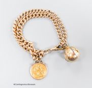 A 9ct gold graduated curb link, double strand bracelet, hung with a yellow metal mounted 1914 gold