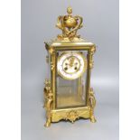A French ormolu four glass lantern clock, height 45cmWith Mercury filled pendulum bob