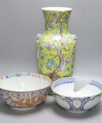 A large 19th century Chinese yellow ground vase and two 18th century Chinese porcelain bowls,
