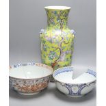 A large 19th century Chinese yellow ground vase and two 18th century Chinese porcelain bowls,