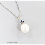 A modern Moire 375 white metal, single stone cultured pearl and three stone sapphire set pendant,