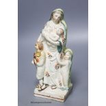 A Staffordshire pearlware group of a mother and children, c.1800, height 19cm