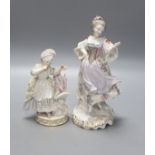 A Meissen figurine, and a continental porcelain figure of a lady with pseudo Derby Mark, tallest