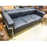 A Corbusier style chrome and black leather three seater sofa, length 180cm, depth 68cm, height 69cm