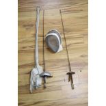 A fencing foil and accessories