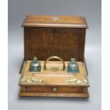 An Edwardian oak stationery box and an oak inkstand