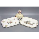 Two 18th century Vienna porcelain trays and a seated figure, largest tray 16cm