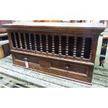 An 18th century and later oak, beech and walnut hanging food cupboard,having spindle front with