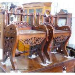 A pair of Victorian style mahogany hall seats in the manner of Shoolbred. W-47, D-38, H-76cm.