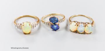 Two modern 9ct gold, opal and diamond set dress rings, size P & P/Q and one other 9ct gold and two