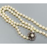 A single strand graduated cultured pearl necklace, with yellow metal, diamond and cultured pearl