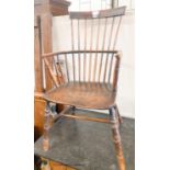 A 19th century elm and fruitwood Windsor comb back armchair, width 50cm, depth 40cm, height 96cm