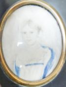 A 19th century portrait miniature of a girl, inscribed verso 'Great Grandmother Machim'