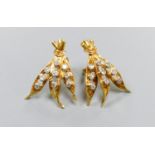 A pair of modern yellow metal and nine stone diamond chip set triple leaf earrings, 20mm, gross