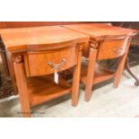 A pair of mahogany bowfront bedside cabinets, width 50cm, depth 50cm, height 62cm