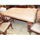 An Arts & Crafts pine rectangular kitchen table, 184cm x 120cm H.76cm