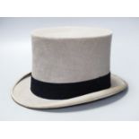 A Scott & Company brown leather case containing a grey top hat