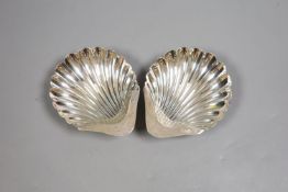 A pair of George V silver butter shells, Atkin Bros. Sheffield, 1920, 12cm, 111 grams.