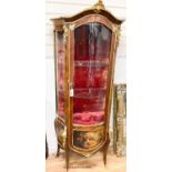 A Louis XV style kingwood bombe vitrine, with Vernis Martin style panels and ormolu mounts, width