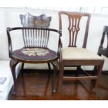 An Edwardian marquetry inlaid mahogany elbow chair and a George III provincial oak dining chair