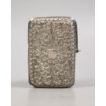 A Persian embossed white metal cigarette case (a.f.), 97mm, 117 grams.