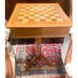 A mahogany games table, width 40cm, depth 40cm, height 74cm