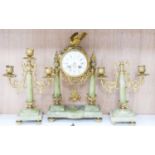 An ormolu and green onyx clock garniture