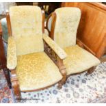 A pair of Victorian carved walnut chairs, (one with arms)