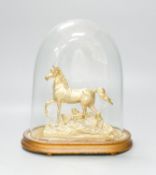 A Victorian gilt metal model of a horse with trophies of war to the base, under a glass dome, total