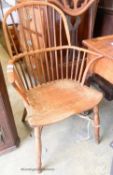 An early 19th century yew and elm Windsor elbow chair, width 59cm, depth 40cm, height 97cm