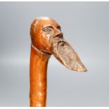 A 19th century carved briar walking stick